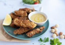Cooking … Coconut and macadamia crusted chicken with honey mustard dressing