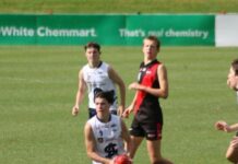 Kangaroo Island football players kicking goals on mainland