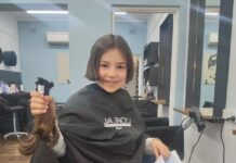 Martina gets hair chopped for Variety’s Hair with a Heart