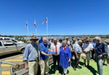French flag ceremony at Rebuild Independence Group shed at American River