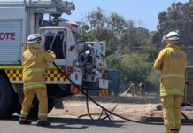 Grassfire sparked on vacant block as construction of government housing begins